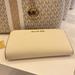 Michael Kors Bags | Michael Kors Jet Set Travel Large Double Zip Wristlet Wallet Light Cream Leather | Color: Gold/White | Size: Large