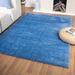 Blue 87 x 62 x 1 in Area Rug - Latitude Run® Solid Color Power Loom 5' x 7' Area Rug in Polypropylene | 87 H x 62 W x 1 D in | Wayfair