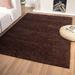 Brown 87 x 62 x 1 in Area Rug - Latitude Run® Solid Color Power Loom Shag 5' x 7' Area Rug in Polypropylene | 87 H x 62 W x 1 D in | Wayfair