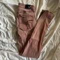 American Eagle Outfitters Jeans | American Eagle Super Stretch Skinny Jeggings Pink / Pale Pink Jeans Size 2 | Color: Pink | Size: 2