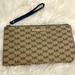 Michael Kors Bags | *Nwot* Michael Kors Wristlet W/ Blue Strap | Color: Tan | Size: Os