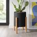 Mercury Row® Liam Round Modern Indoor Pot Planter w/ Wood Legs Wood/Ceramic/Stone in Black | 22 H x 15.5 W x 15.5 D in | Wayfair