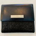 Gucci Bags | Gucci Vintage Monogram Leather Wallet. Black Leather And Gg Canvas Fabric. | Color: Black | Size: Os