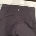 Lululemon Athletica Pants & Jumpsuits | Lululemon Athletica Black Capri Legging With Mesh At Bottom Size 6 | Color: Black | Size: 6