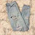 American Eagle Outfitters Pants & Jumpsuits | American Eagle Super Super Stretch Distressed High Rise Jeggings | Color: Blue | Size: 0