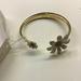 Kate Spade Jewelry | Kate Spade New White Daisy Hinged Cuff Bracelet | Color: Gold/White | Size: 2-1/4" Bracelet; 1" And 1/2" Daisies