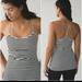 Lululemon Athletica Tops | Lululemon Power Y Tank Stripe Animal Print Luon 4 | Color: Black/Cream | Size: 4