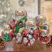 The Holiday Aisle® 10 Piece Clela Figurine Set Wood in Brown/Green/Red | 5.5 H x 3.5 W x 3.5 D in | Wayfair 8955D3EE773F48E6B5200BD871573704