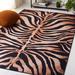 Black/Brown 144 x 108 x 0.25 in Indoor Area Rug - Everly Quinn Animal Print Power Loom Polyester Area Rug in Light Orange/Black Polyester | Wayfair