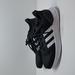 Adidas Shoes | Adidas Questar Flow Nxt Black Athletic Shoes 9 1/2 | Color: Black/White | Size: 9.5