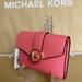 Michael Kors Bags | Michael Kors Carmen Medium Logo And Faux Leather Wallet Grapefruit | Color: Gold/Pink | Size: Medium