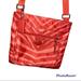 Coach Bags | Coach Orange Nylon Zebra Getaway Crossbody Bag. Excellent Used Condition. | Color: Orange/Red | Size: Os