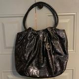 Michael Kors Bags | Michael Kors Purse And Wallet. Purse Slightly Used. Wallet Like New. | Color: Silver | Size: Large Purse And Wallet