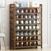 Everly Quinn 24 Pair Shoe Rack Bamboo in Brown | 49.21 H x 27.55 W x 9.84 D in | Wayfair 965407AB4AA14B828D314B5055B4957B