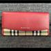 Burberry Bags | Burberry Calfskin Horseferry Check Porter Continental Wallet Red | Color: Cream/Red | Size: Os