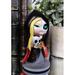 The Holiday Aisle® Cozie Norsies Hela Figurine Resin in Black/Red/White | 3.75 H x 2.25 W x 2 D in | Wayfair 99F9192E4491435F97A09DF140CC9D61