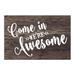 East Urban Home Come in We're Awesome 27" x 18" Non-Slip Outdoor Door Mat Natural Fiber/Rubber in Black/Brown/White | Wayfair