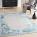 Blue/White 89 x 66 x 0.75 in Area Rug - Wrought Studio™ Rectangle Anjae Abstract Handmade Tufted Viscose Indoor Area Rug in Beige/Blue Viscose, | Wayfair