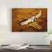 East Urban Home 'A North American P-51D Mustang in Flight' Photographic Print on Canvas in White/Yellow | 12 H x 18 W x 1.5 D in | Wayfair