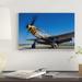 East Urban Home 'A P-51 Mustang at Waukegan Illinois' Photographic Print on Canvas in Blue/Gray/Yellow | 18 H x 26 W x 1.5 D in | Wayfair