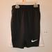 Nike Bottoms | Boy 6 To 7 Nike Running Shorts. Ecxellent Condition. Black And White. | Color: Black/White | Size: 6 To 7