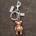 Coach Accessories | **Coach Rosegold Or Yellow Gold Bear Keychain | Color: Gold/Pink | Size: 4 1/4 In.