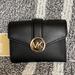 Michael Kors Bags | Michael Kors Carmen Medium Logo And Faux Leather Wallet Black | Color: Black/Gold | Size: Medium