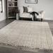 White 90 x 63 x 1.1 in Area Rug - Latitude Run® Latitude Run Zanai Solid Beige Stain Resistant Shag Area Rug | 90 H x 63 W x 1.1 D in | Wayfair