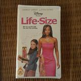 Disney Media | Life Size Vhs Tape | Color: Pink/White | Size: Os