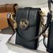 Michael Kors Bags | Michael Kors Carmen Small Faux Leather Phone Crossbody Bag | Color: Black/Gold | Size: Medium