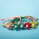 Bracelet main dinosaure multicolore pour enfants cadeau préféré des enfants dessin animé vente en