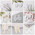 Boucles d'oreilles pendantes longues avec pompon en cristal pour femmes bijoux d'oreille blancs