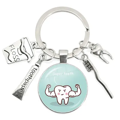 Porte-clé avec motif de dents de dessin animé nouveau créatif mignon médaille de dentiste