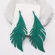 Boucles d'oreilles longues en cuir chevelu vert pour femme or noir plume en métal bijoux exagérés