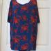 Lularoe Tops | Lularoe Irma Tunic Medium Nwot Navy Blue With Red Print Stretch High Low New | Color: Blue/Red | Size: M