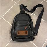 Coach Bags | Coach New York Trek Terrain Sling Backpack Bag Perfed Leather Black Single Strap | Color: Black/Brown | Size: Os