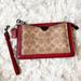 Coach Bags | Coach Coated Canvas Signature Dreamer Wristlet Tan Red Apple Nwt | Color: Red/Tan | Size: Os