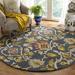 Blue 132 x 0.47 in Area Rug - Langley Street® Ferrera Handmade Tufted Wool Navy Multi Rug Wool | 132 W x 0.47 D in | Wayfair