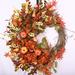 The Holiday Aisle® 26" Wreath Silk/Wood/Twig in Orange | 26 H x 26 W x 6 D in | Wayfair 1E8AC5078E8041C395523EF89AE77257