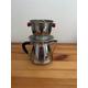 A French vintage trio of chromed metal jug and one cup coffee percolator with basket for granules