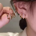 Boucles d'oreilles coréennes punk gothiques à quatre griffes pour femmes boucles d'oreilles