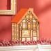 The Holiday Aisle® Christmas Advent Calendar House Wood in Brown | 9.75 H x 7 W x 12.25 D in | Wayfair A3043370BC6D4DAAB320C5D69370B010