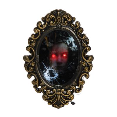 Broken Mirror With Creepy Face