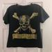 Disney Shirts & Tops | Disney Parks Pirates Of The Caribbean Skull T-Shirt Authentic Medium Youth | Color: Black/Gold | Size: Mb