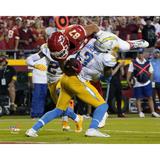 Derwin James Jr. Los Angeles Chargers Unsigned Tackles Travis Kelce Photograph