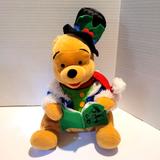 Disney Holiday | Disney Musical Animated Pooh Bear 11" Sitting | Color: Black/Blue/Green/Red | Size: Os