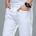 Jeans baggy coupe slim en denim blanc pour hommes pantalons classiques motard doux haute qualité