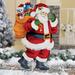 The Holiday Aisle® Santa Claus w/ Gift Sack Outdoor Figurine Metal in Red | 25.25 H x 0.25 W x 13 D in | Wayfair 55835BC591BB490CB203ED9AD0C1C3D2