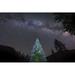 A lone lit pine tree glows under the arch of the Milky Way Poster Print