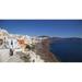 Panoramic Images PPI122781 High angle view of a town on an island Oia Santorini Cyclades Islands Greece Poster Print by Panoramic Images - 36 x 19